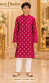 Lakshman Fuchsia size 12: age-appropriate child model wearing the embellished kurta and white polo pajama set.
