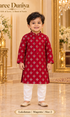 Lakshman Magenta size 2: age-appropriate child model wearing the embellished kurta and white polo pajama set.