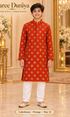 Lakshman Orange size 12: age-appropriate child model wearing the embellished kurta and white polo pajama set.
