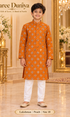 Lakshman Peach size 10: age-appropriate child model wearing the embellished kurta and white polo pajama set.