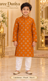 Lakshman Peach size 6: age-appropriate child model wearing the embellished kurta and white polo pajama set.
