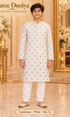 Lakshman White size 12: age-appropriate child model wearing the embellished kurta and white polo pajama set.