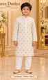 Lakshman White size 6: age-appropriate child model wearing the embellished kurta and white polo pajama set.