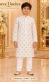 Lakshman White size 8: age-appropriate child model wearing the embellished kurta and white polo pajama set.
