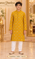 Lakshman Yellow size 12: age-appropriate child model wearing the embellished kurta and white polo pajama set.