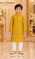 Lakshman Yellow size 4: age-appropriate child model wearing the embellished kurta and white polo pajama set.