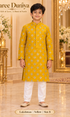 Lakshman Yellow size 8: age-appropriate child model wearing the embellished kurta and white polo pajama set.