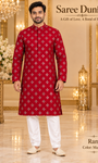Ram Magenta adult model wearing the embellished kurta and white polo pajama set in the Saree Duniya showroom.