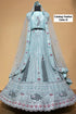 Feathers — B – Ice Blue; original photograph showing the semi-stitched size 44 lehenga and unstitched blouse fabric with peacock embroidery.