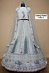 Feathers — C – Ivory; original photograph showing the semi-stitched size 44 lehenga and unstitched blouse fabric with peacock embroidery.