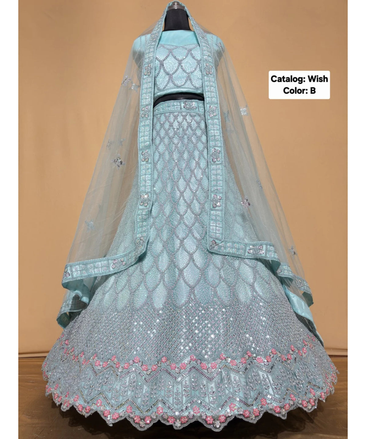 Wish — B – Ice Blue; original photograph showing the semi-stitched size 44 lehenga and unstitched blouse fabric with scalloped sequin work.