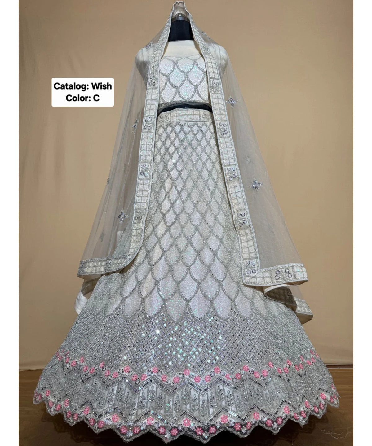 Wish — C – Ivory; original photograph showing the semi-stitched size 44 lehenga and unstitched blouse fabric with scalloped sequin work.