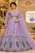 Shubh Labh – Exp 10, Color B – Lavender, sizes 38, 40, 42 and 44. Saree Duniya model wearing the embellished lehenga with sheer long sleeves, arched blouse hem and peacock panels.