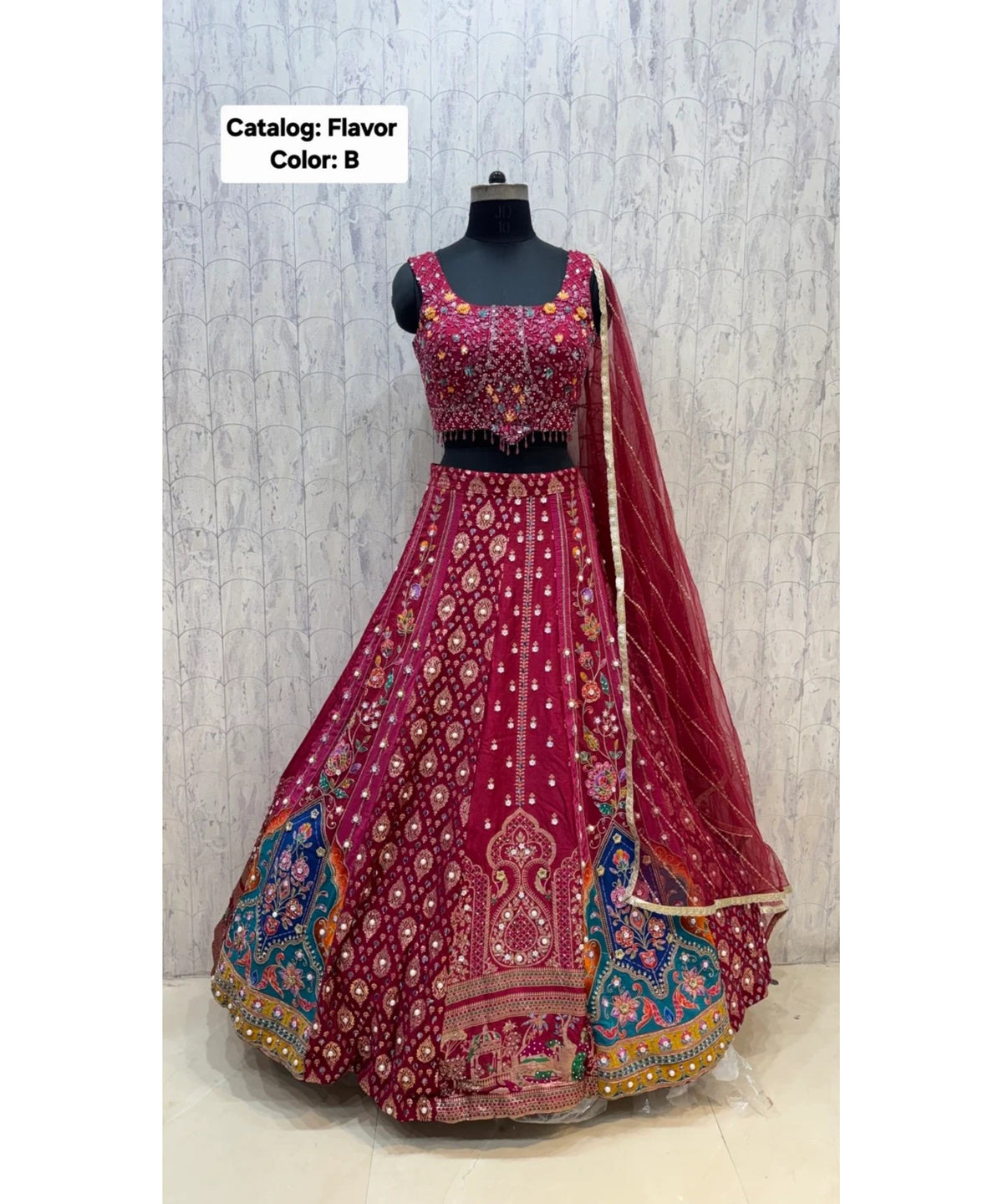 Flavor — Color B, size 40; original full length of fully stitched lehenga with sleeveless blouse.