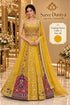 Flavor — Color A, Yellow, size 40; model styling of fully stitched lehenga with sleeveless blouse and coordinating dupatta.