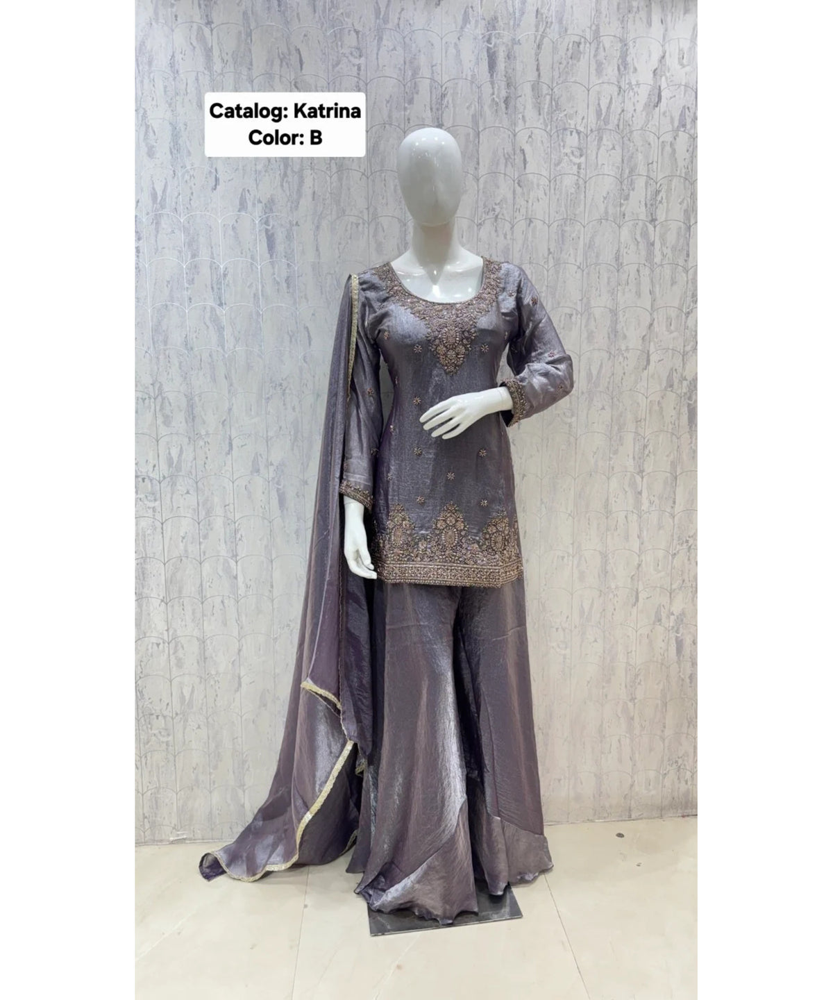 Katrina — Color B; original fully stitched designer suit, size 40.