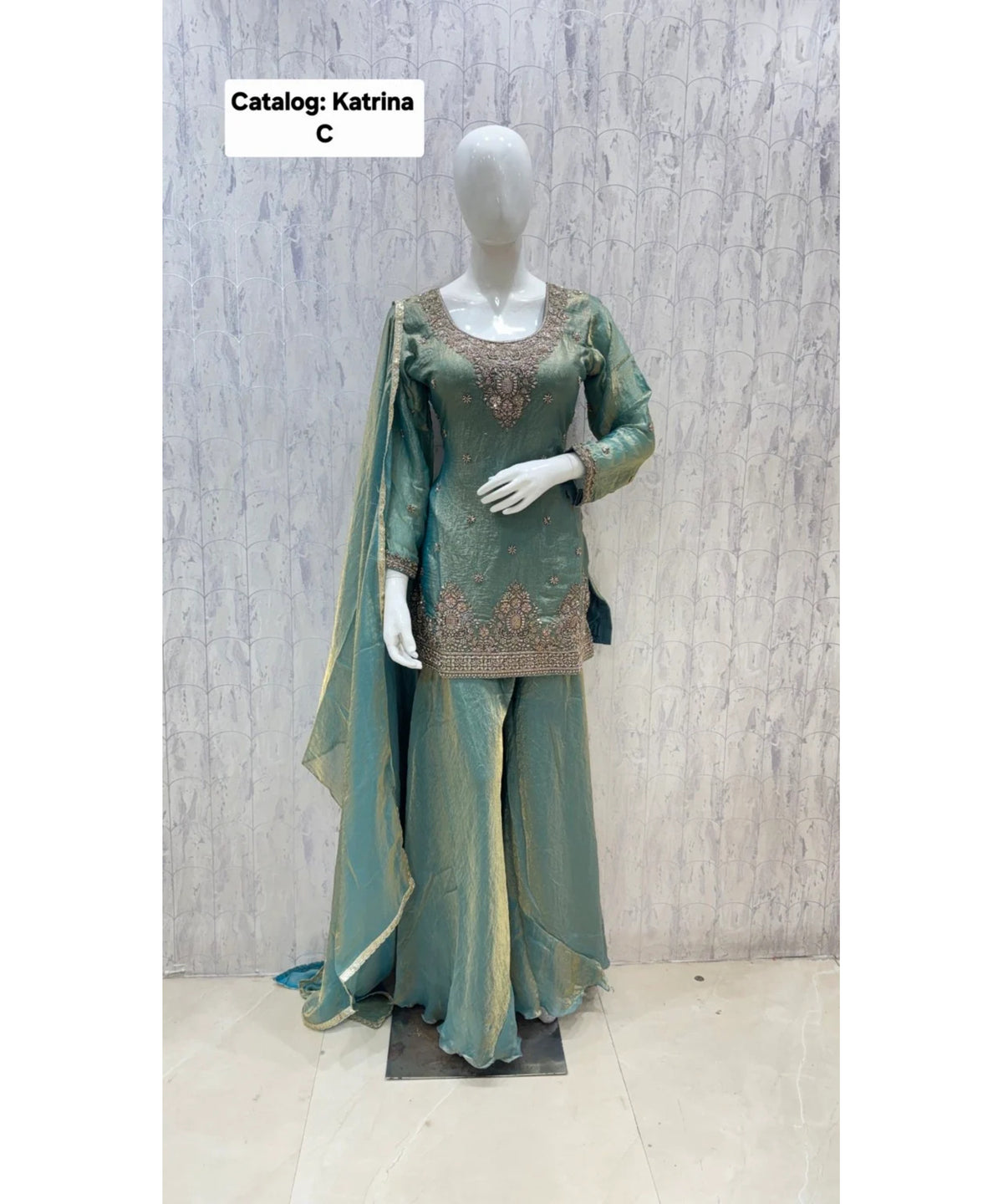 Katrina — Color C; original fully stitched designer suit, size 40.