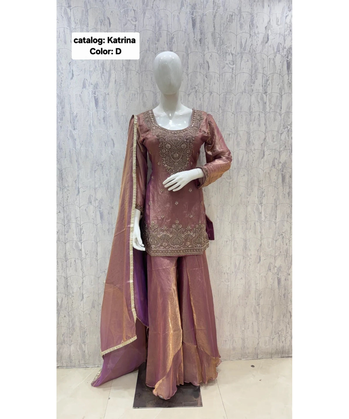 Katrina — Color D; original fully stitched designer suit, size 40.