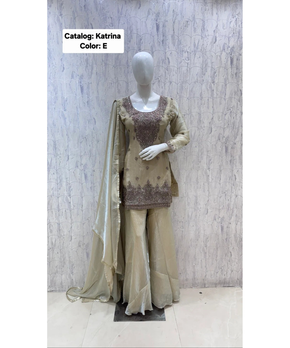 Katrina — Color E; original fully stitched designer suit, size 40.