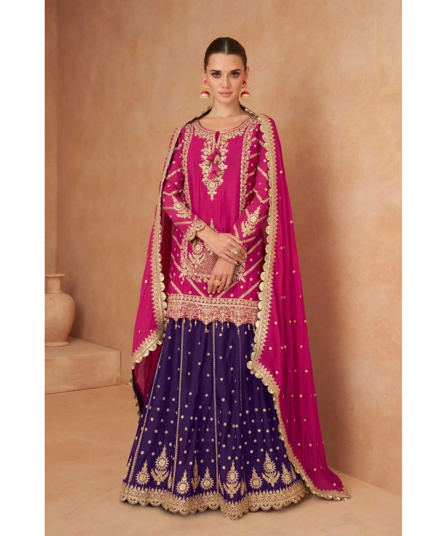 Khanak — style 7471-A, magenta embroidered top and deep-purple lehenga skirt with coordinating dupatta; original full-length photo.