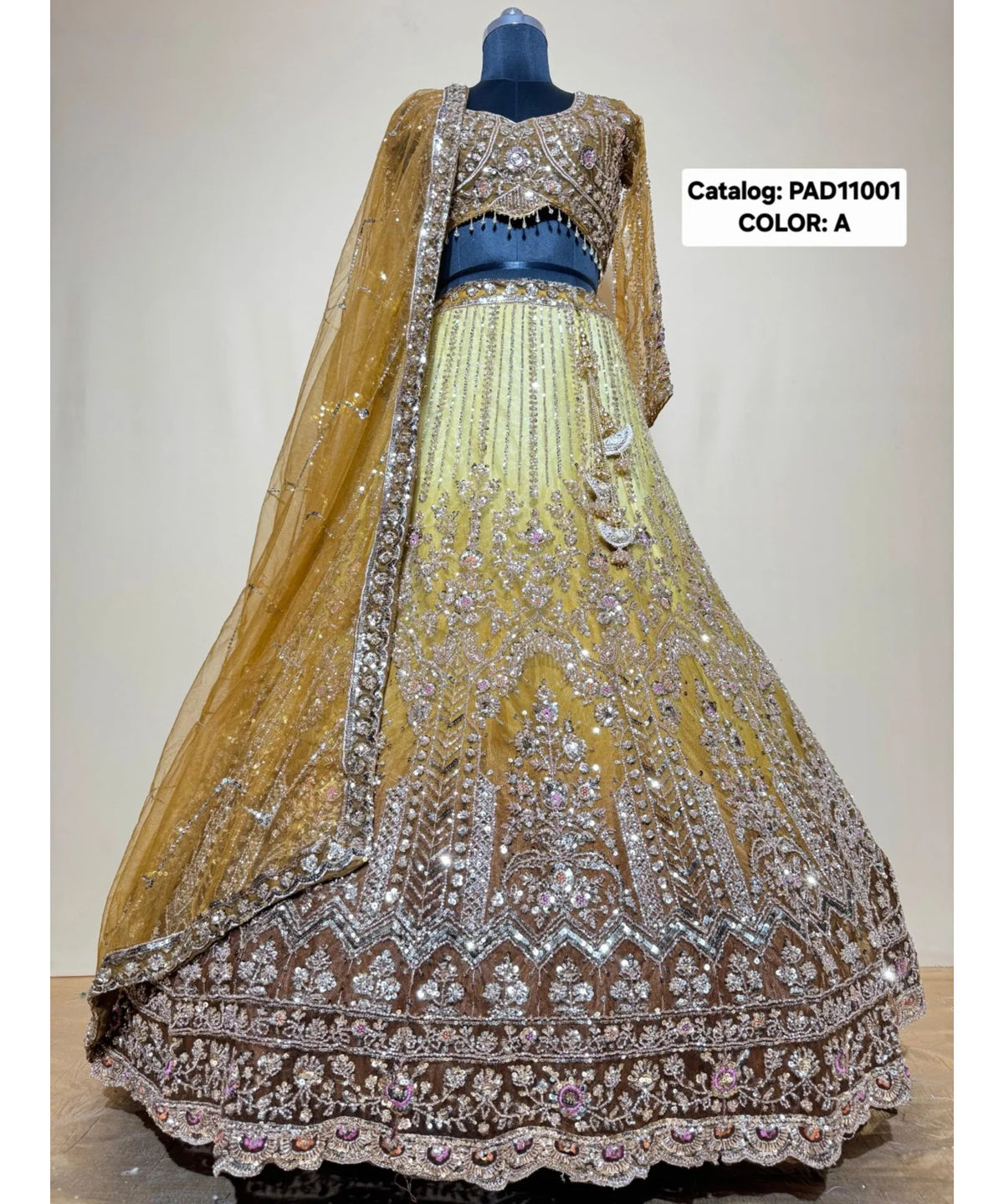 PAD11001 - Exp 11, Color A, size 42 - original mannequin photograph showing the fully stitched embellished designer lehenga.