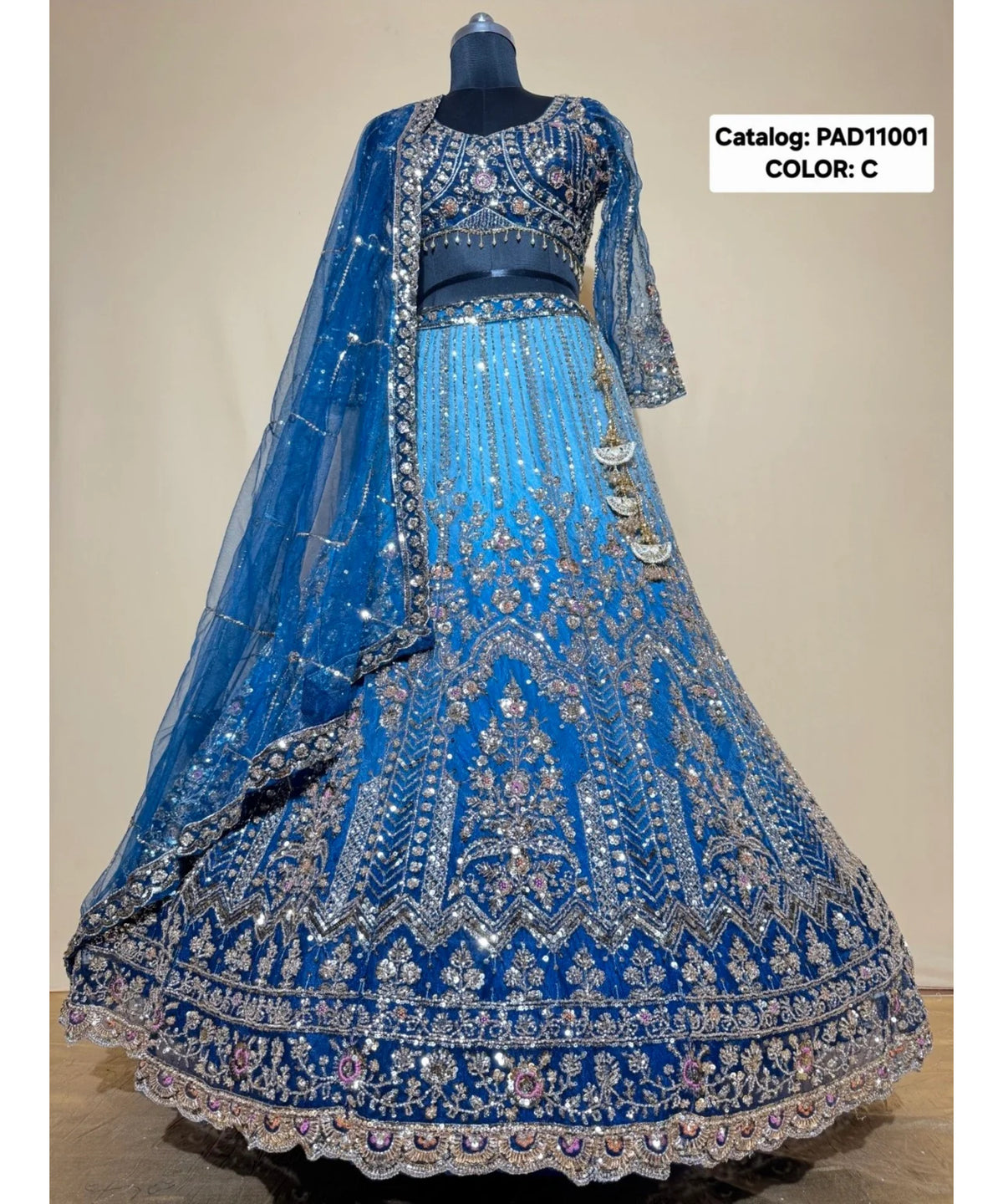 PAD11001 - Exp 11, Color C, size 42 - original mannequin photograph showing the fully stitched embellished designer lehenga.