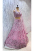 Catalog: Curvv - Exp 11. Pink, size 40. Original angled photograph showing the cold-shoulder blouse, embroidered skirt and sheer dupatta.