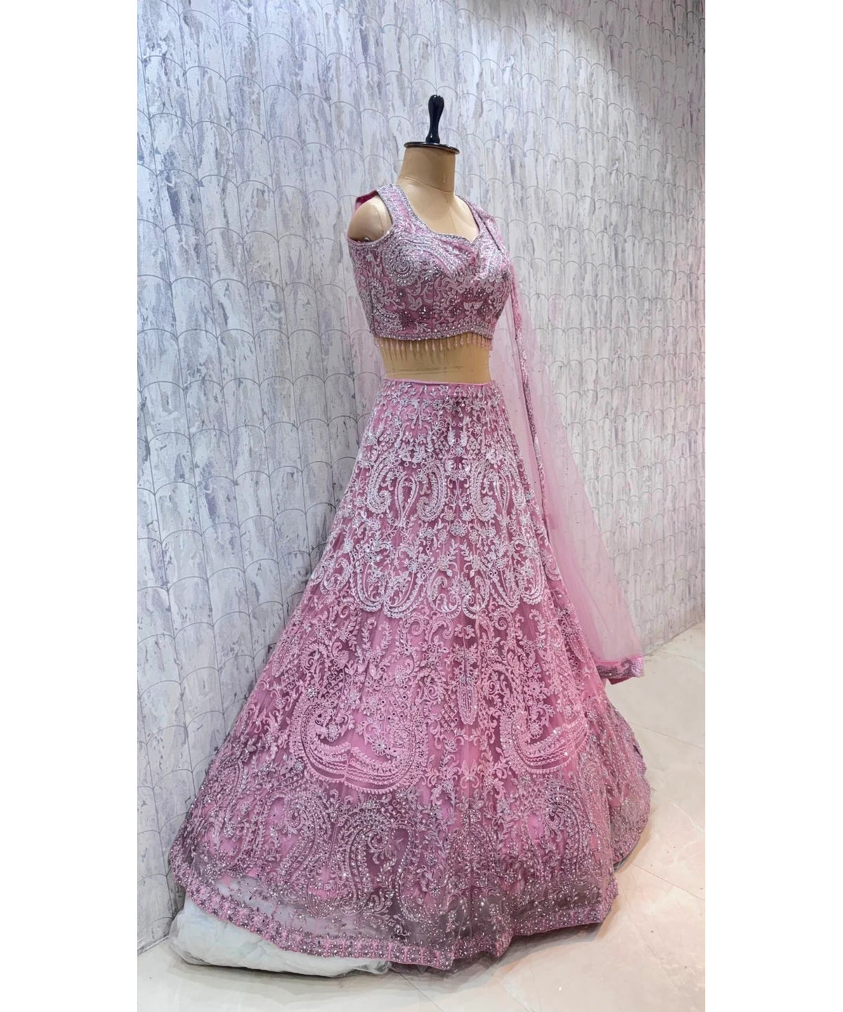 Catalog: Curvv - Exp 11. Pink, size 40. Original angled photograph showing the cold-shoulder blouse, embroidered skirt and sheer dupatta.