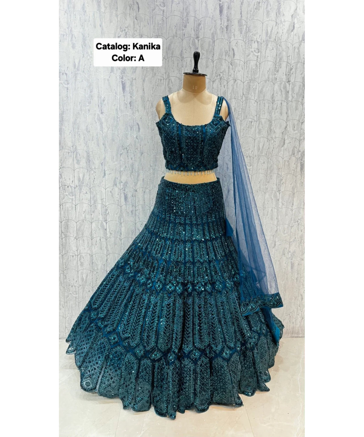 Catalog: Kanika - Exp 11. Color A, size 40. Original photograph of the fully stitched sequin-embellished lehenga, blouse and dupatta.