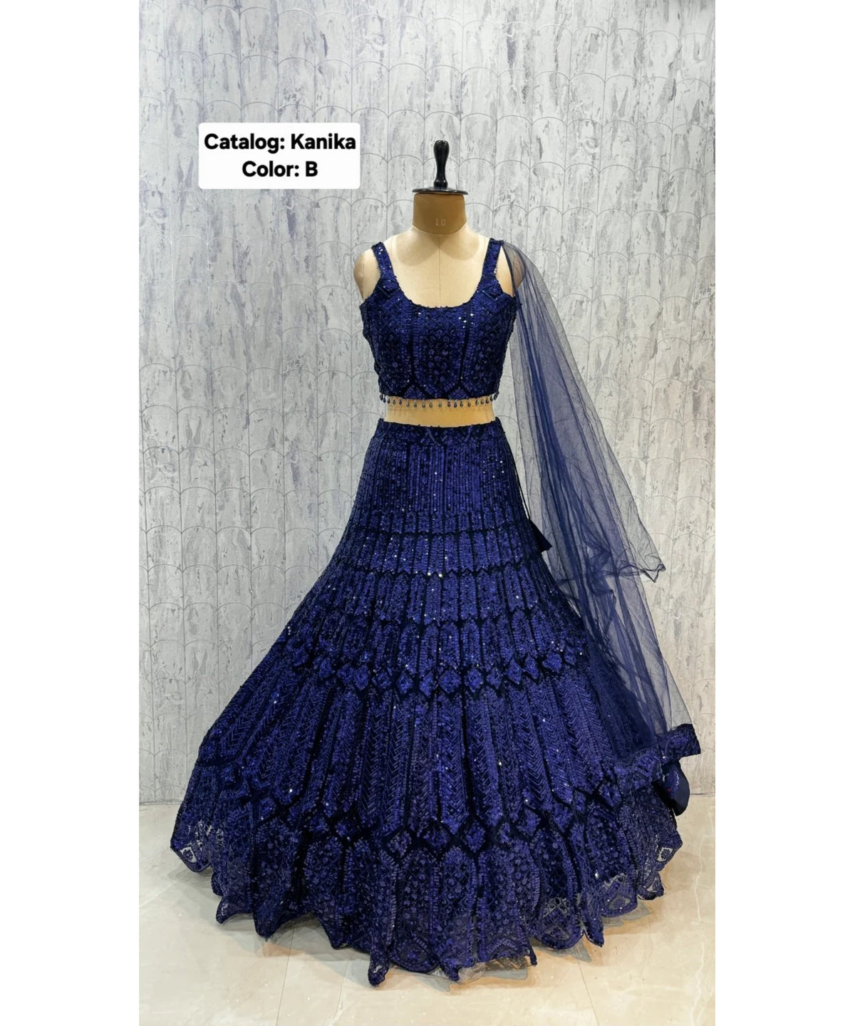 Catalog: Kanika - Exp 11. Color B, size 40. Original photograph of the fully stitched sequin-embellished lehenga, blouse and dupatta.
