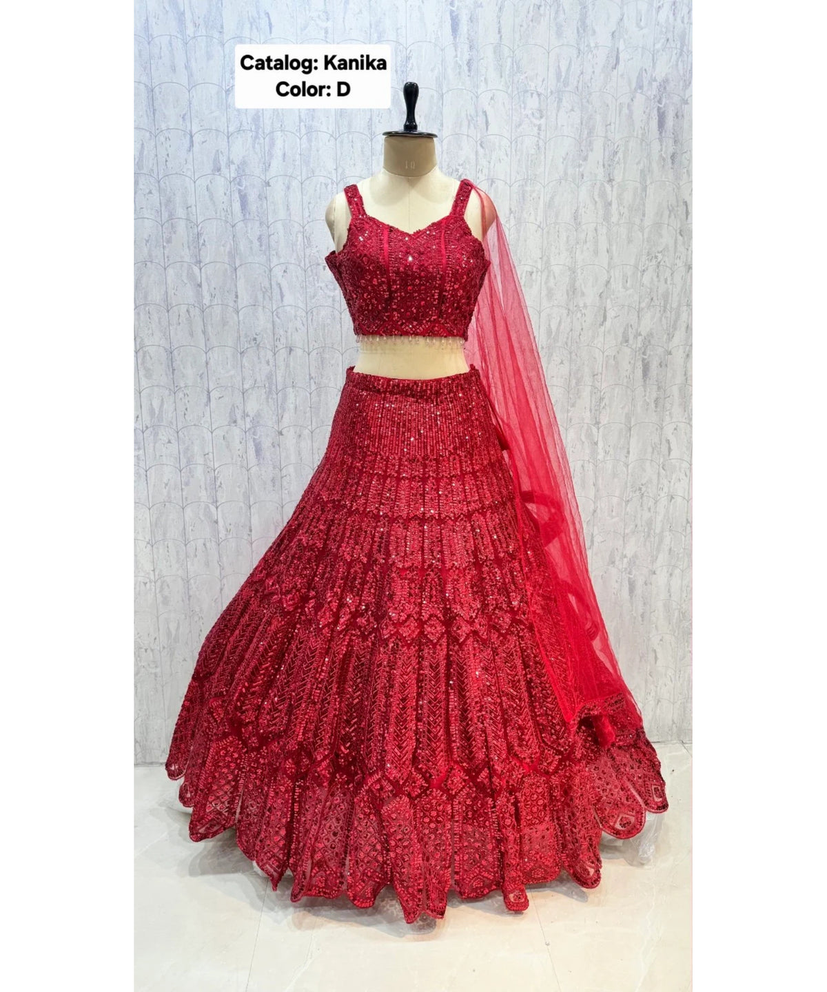 Catalog: Kanika - Exp 11. Color D, size 40. Original photograph of the fully stitched sequin-embellished lehenga, blouse and dupatta.