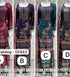 Original Catalog 55943 photograph showing designer suit styles A, B, C, and D.