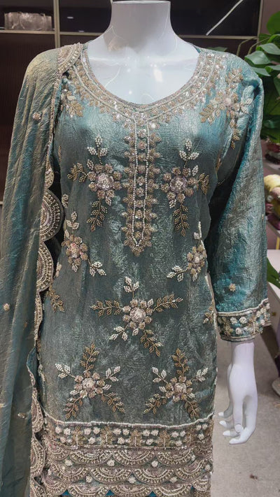 Catalog 1681 Color A original product video - deep muted teal / petrol green-blue with a metallic pale-gold sheen embellished designer suit, palazzo pants and dupatta